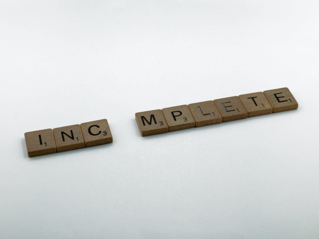 incomplete scrabble tiles to show how many hours to develop an app