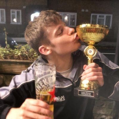 image of harry dry kissing a trophy