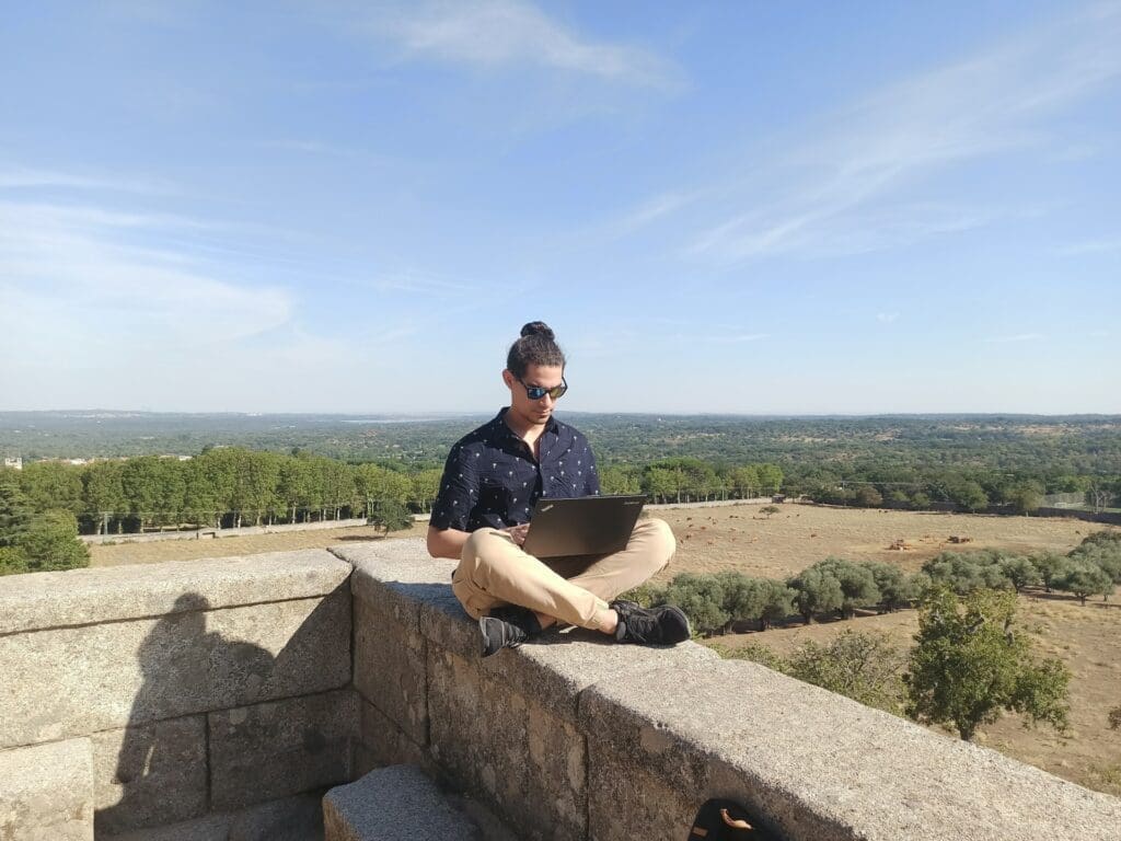 a competent developer working outdoors to show one of it outsourcing challenges
