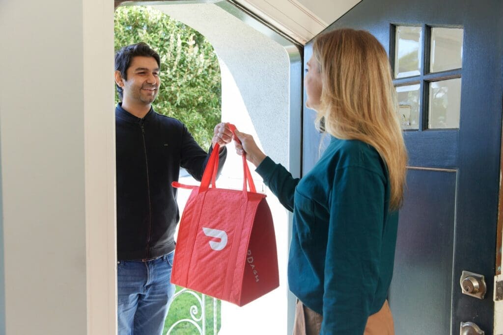 man delivering food to customer